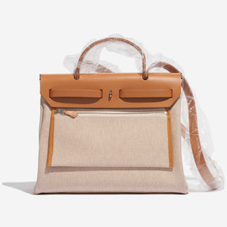 Hermès Herbag Zip Backpack 31 Gold / Ecru back view