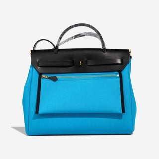Hermès Herbag Zip Backpack 31 Brique / Ecru side view