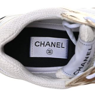 Chanel CC Logo Trainer Sneaker White/Gold detail view
