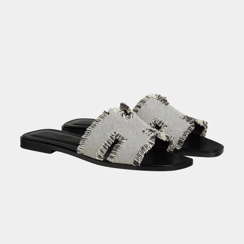 Hermès Women Oran Sandal Noir (Fringed linen canvas)