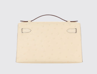 Hermès Kelly Pochette Nata side view